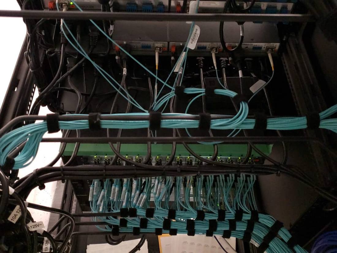Structured cabling detail feeding a network equipment rack