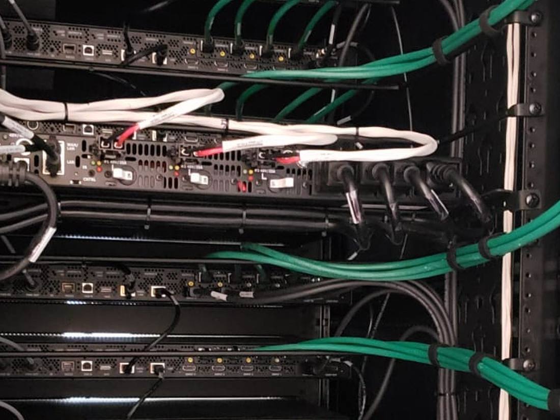 Vertical equipment rack with dressed cable runs