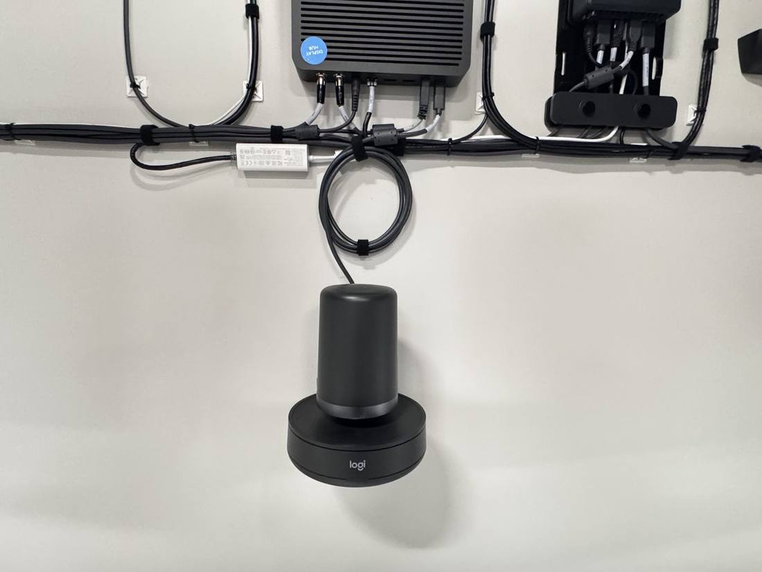 Display hub and Logitech camera mount close-up
