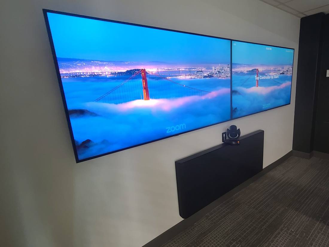 Dual-display Zoom Room with twin PTZ cameras