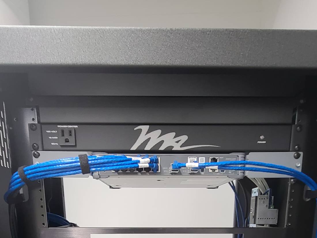 Rack-mounted power and network distribution gear with structured cabling