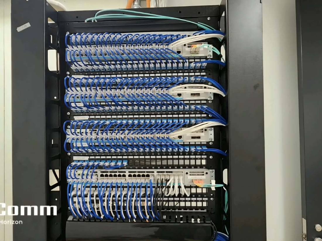 Structured cabling patch panel with labeled terminations