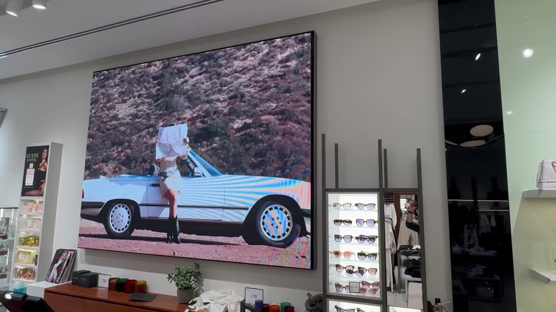Framed LED video wall running a desert fashion campaign